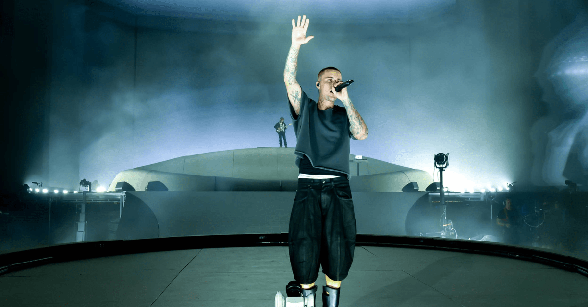 Justin Bieber performing at Coachella 2026 as fans showcase Skylrk merchandise