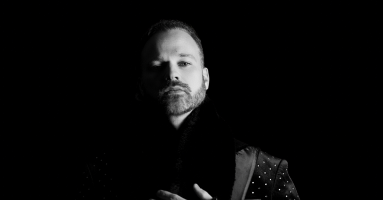 Chase Bell performing live on stage at international music event