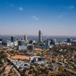 A modern African city skyline symbolizing the continent’s $2 trillion domestic capital growth and infrastructure development boom