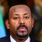 Ethiopian coffee farmers preparing export-grade beans as the country records $8.7 billion in export revenue growth driven by currency reforms.