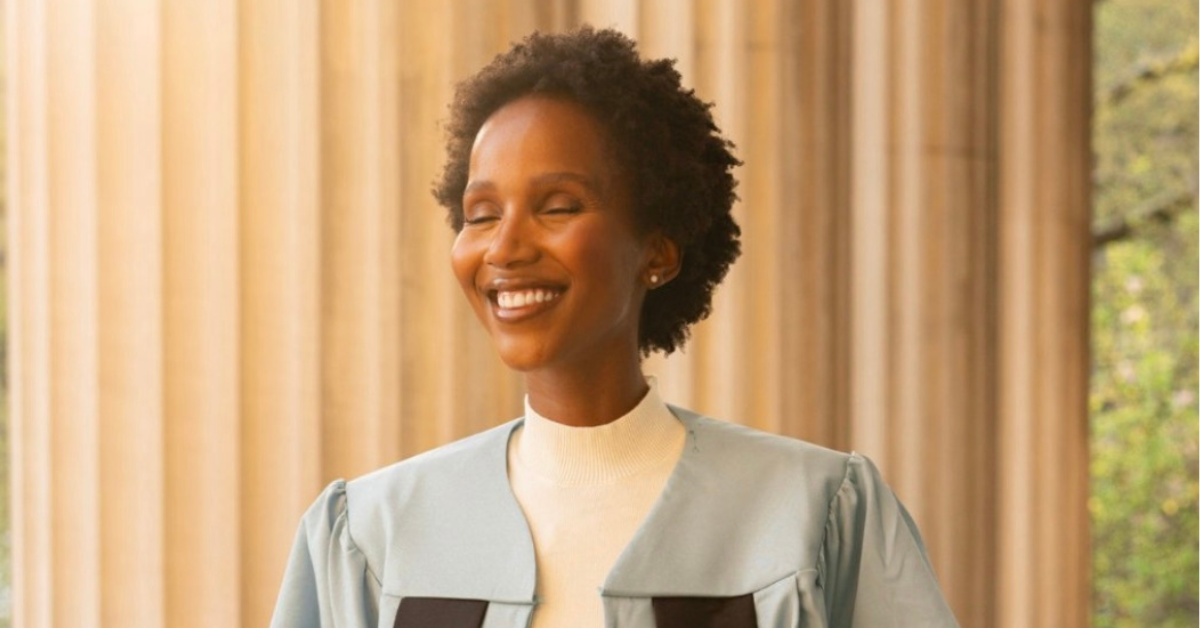 Shudufhadzo Musida celebrates graduating from Columbia University with a master’s degree in New York City.