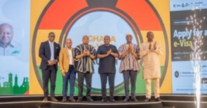 A modern airport scene in Ghana showing African travellers using digital immigration systems as President John Dramani Mahama announces the country’s new e-visa platform and visa fee waivers.