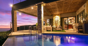 Scenic view of the Garden Route coastline in South Africa showing luxury homes, green landscapes, and coastal estates popular among expats, retirees, and foreign property investors.