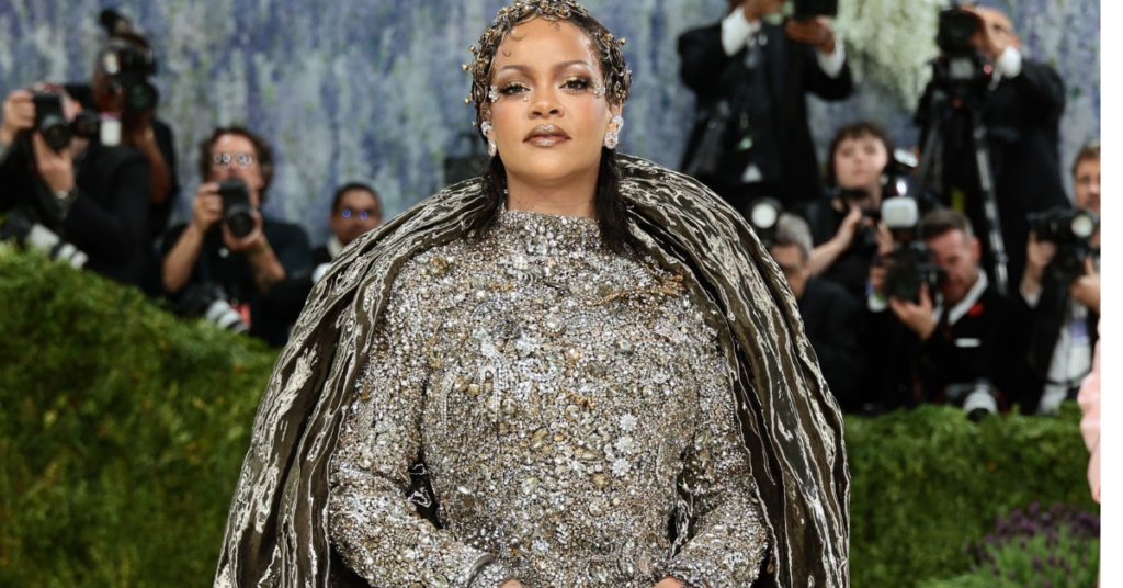 Rihanna arrives at the Met Gala 2026 wearing a custom Maison Margiela Artisanal gown embellished with crystals and antique jewels.