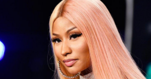 Nicki Minaj celebrates first Billboard No. 1 as Beauty And A Beat tops global chart.