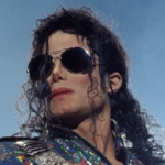 Michael Jackson performing on stage during the peak of his legendary music career.