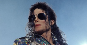 Michael Jackson performing on stage during the peak of his legendary music career.