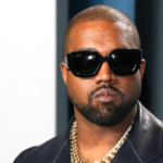 Ye performs on stage during a listening event as jury orders payment in copyright sample lawsuit.