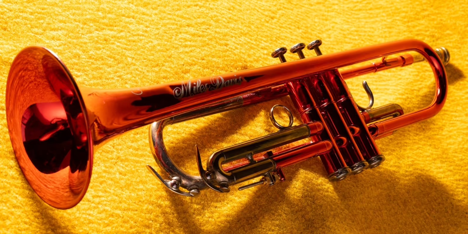 Grammy Museum Tower of Song exhibit featuring Prince glasses, Kurt Cobain guitar and Janet Jackson memorabilia.