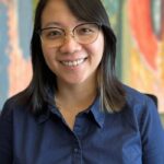 Khanh Nguyen celebrates earning her electrical engineering degree after returning to school while balancing family and work responsibilities.