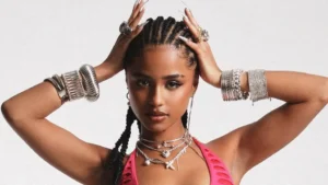 Tyla poses with her two awards after winning Best Afrobeats Artist and Social Song of the Year at the 2026 American Music Awards in Las Vegas.