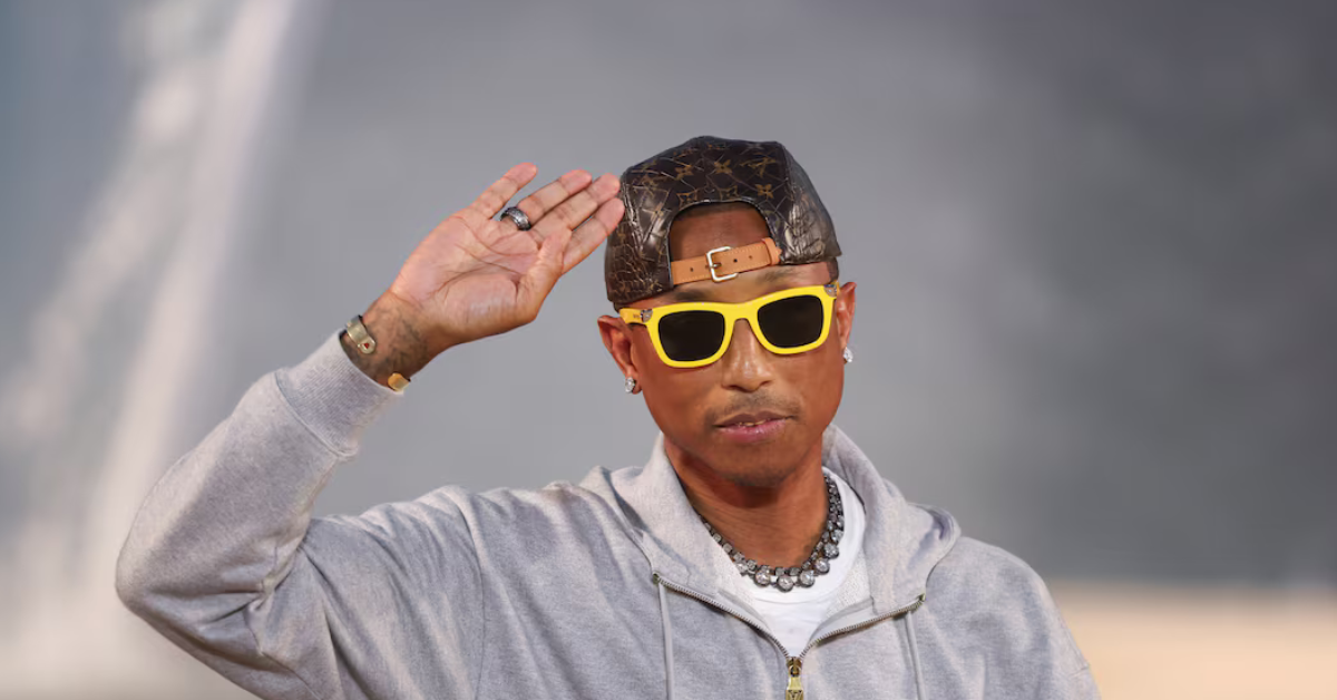 Pharrell Williams walks the runway after Louis Vuitton’s Spring Summer 2027 menswear show beneath a giant surfing wave during Paris Fashion Week.