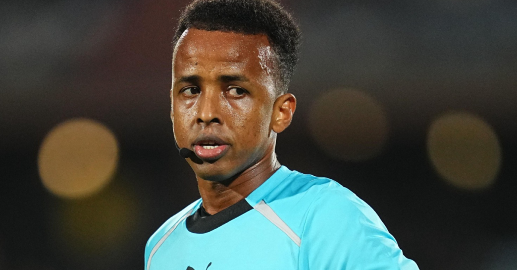Somali referee Omar Abdulkadir Artan was denied entry into the United States ahead of FIFA World Cup 2026 despite holding a valid visa. Global leaders, football stars, and fans have condemned the decision.
