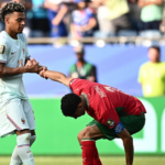 Morocco players applaud supporters after their World Cup quarter-final defeat to France.