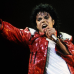 Michael Jackson performing on stage as The Essential Michael Jackson celebrates 550 weeks on the Billboard 200.