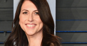 MacKenzie Scott speaking at a public event highlighting philanthropy and charitable giving.