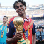 Lamine Yamal celebrates after Spain won the FIFA World Cup trophy.