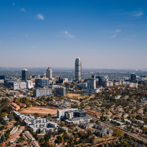 A modern African city skyline symbolizing the continent’s $2 trillion domestic capital growth and infrastructure development boom